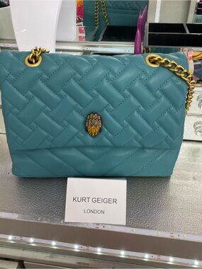 Kurt Quilted white or blue/teal  Crossbody Bag with Gold Accent
HOT ITEM!!!